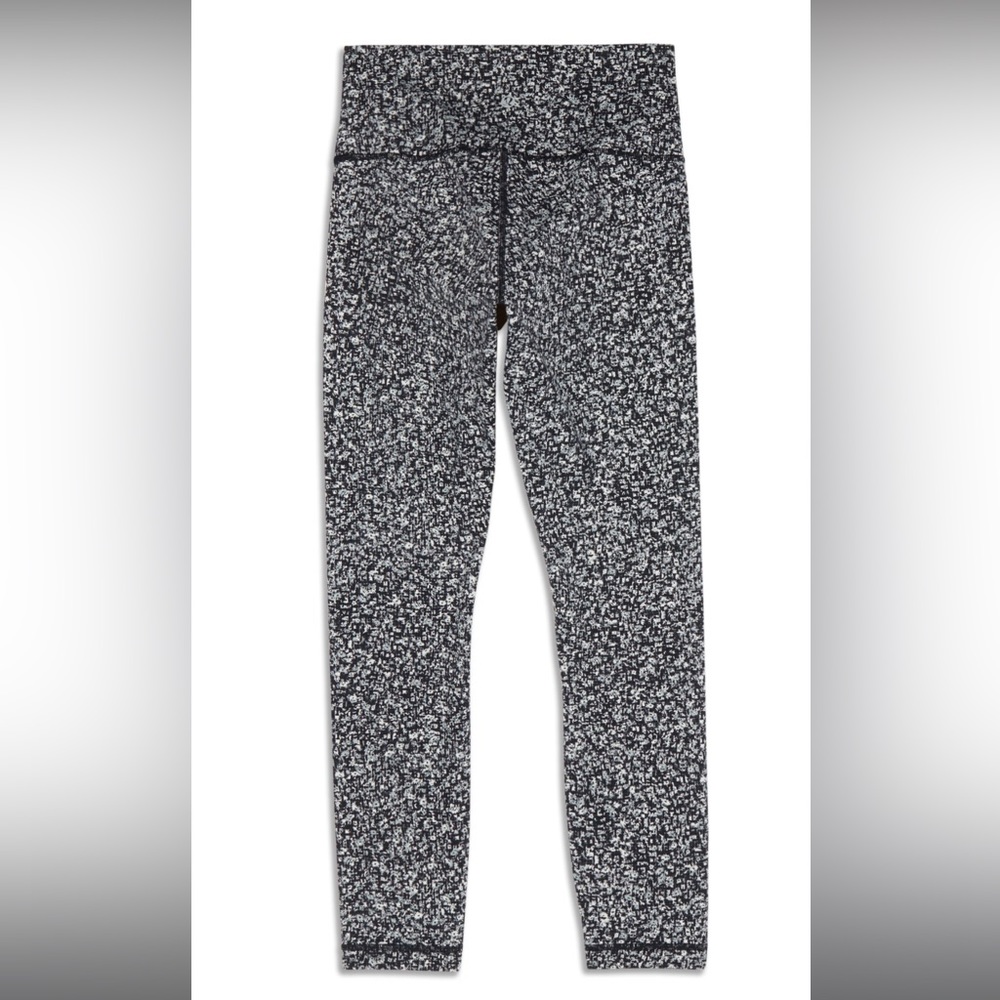 Brand NEW LULULEMON leggings. Black and white pattern. Extremely cute